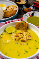Nasi Soto Ayam or Soto Medan is  Traditional chicken soup with rice from Medan, North Sumatra. 

Soto is a traditional Indonesian soup mainly composed of broth, meat, fried patties and vegetables.