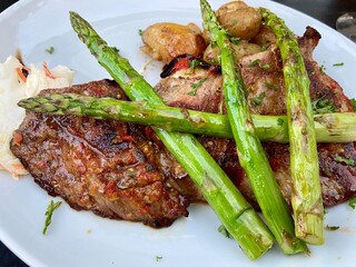 Grilled meat with green asparagus