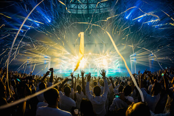 Crowd throwing ribbons during live concert