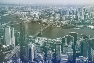 Manhatan aerial view,  two bridges, at east river. Duotone effect. - obrazy, fototapety, plakaty