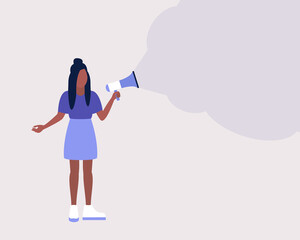 Young woman speaks into a megaphone