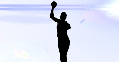 Composition of female handball player on white background with light trails