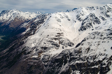 Panorama of a beautiful mountain landscape in the Elbrus region of Kabardino-Balkaria. Mountains in the snow