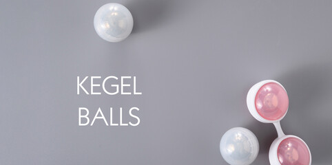 Banner, Ben Wa vaginal pleasure balls, Kegel balls on gray background, top view, soft light, lettering in the middle, empty space for text