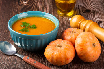 Delicious homemade pumpkin soup in bowl.