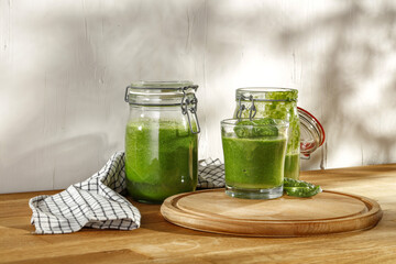 Fresh healthy shake  on wooden desk and wall background 