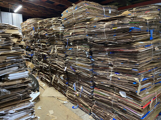 pressed cardboard stacked in stock