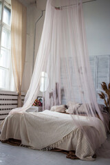 canopy bed with pillows