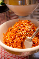 Spicy Korean carrot with spices in a plate
