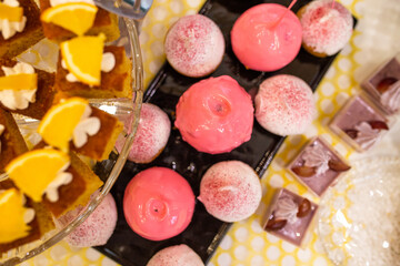 apples in pink caramel on a buffet table