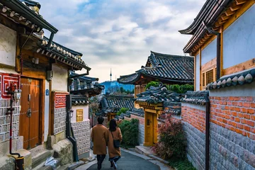 Fototapeten Seoel Bukchon Hanok Village Is the name traditional cultural village in downtown Seoul in the morning, with beautiful shining light, South Korea.  © Noonan
