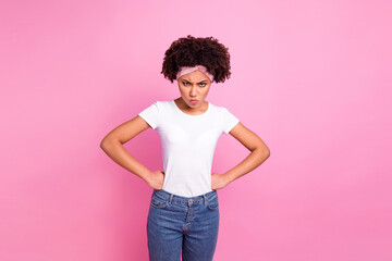 Photo of strict lady frustrated angry face hands hips look camera wear white t-shirt isolated pink background