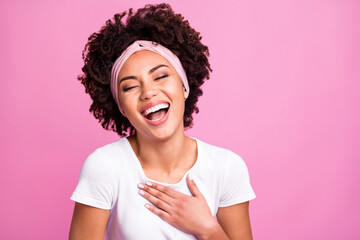 Photo of funny woman hand chest eyes closed open mouth laugh wear white t-shirt isolated pink...