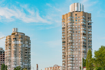 Fototapeta premium Old soviet chaotic rounded multi storey building. Facade. Urban. City. Residential complex. USSR. Design. Architecture