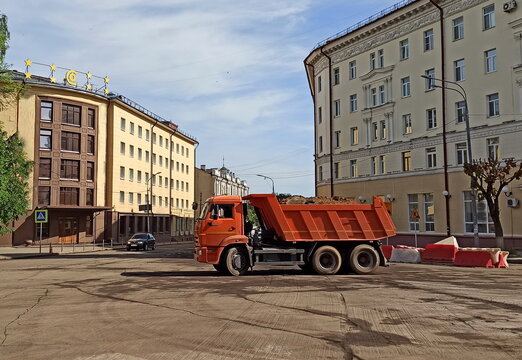 kamaz with sand for road repair
