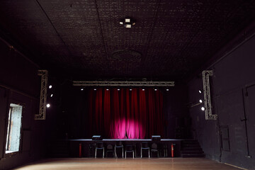 Empty concert hall with small stage