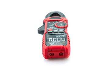Testing electric digital clamp meter isolated on white background.