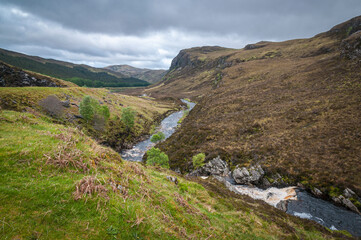 Fototapeta premium A summer, 3 shot, HDR image of the Dundonnell River flowing over waterfalls down the Dundonnell Gorge, Wester Ross, Scotland