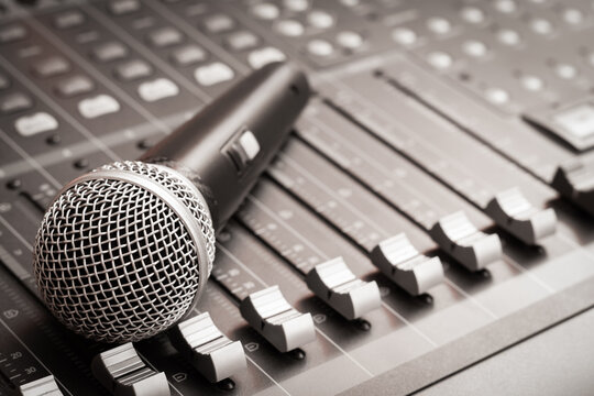 microphone on audio mixer. broadcasting, recording concept
