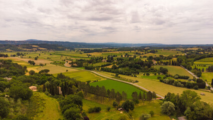 Fototapeta na wymiar Stunning aerial view of the Tuscan countryside with its characteristic spring colors.