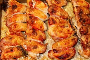 Juicy chicken wings with crispy crust close-up