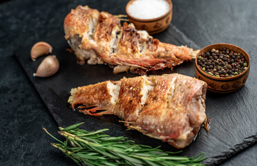 grilled red sea bass on stone background
