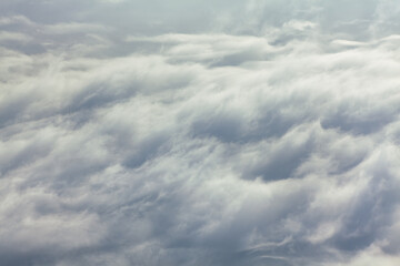 Obraz premium Gray Cloudy Sky Wallpaper . Flight over the Clouds 