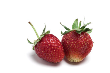 Red ripe strawberries, isolate on a white background.