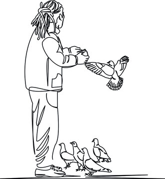 male feeding pigeons