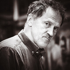 Obraz premium Dramatic portrait of confident male artist . Black and White. Extra crop, add grain