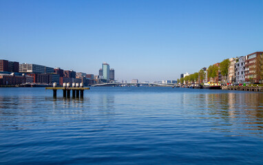 Naklejka premium Sunny day in Amsterdam with a view of the water