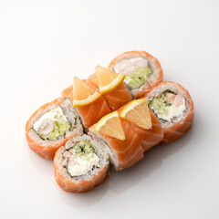 Sushi roll decorated with lemon. Inside-out Sushi Set. Traditional Japanese food. Healthy Oriental meal. Wellness concept. Close up shot. Top Side view. Soft focus. Copy space.