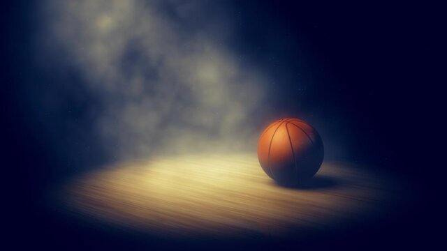 Animation of basketball slowly rolling into spotlight on basketball court
