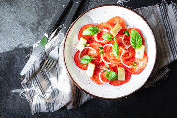 tomato salad and cheese veggie vegetable basil on the table healthy food diet meal snack copy space background rustic. top view vegetarian food