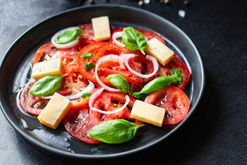 tomato salad and cheese veggie vegetable basil on the table healthy food diet meal snack copy space background rustic. top view vegetarian food
