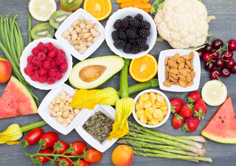Healthy food. colored and various Vegetables and fruits on wood background
