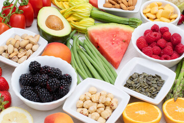Healthy food. colored and various Vegetables and fruits on wood background
