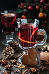 Mulled wine with gingerbread cookies. Christmas composition