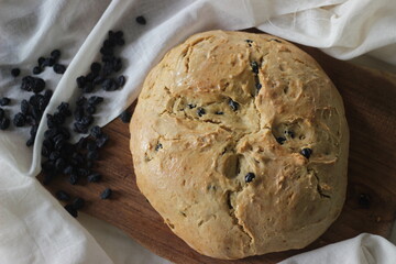 Home baked Irish soda bread with raisins. A quick bread to make at home with out yeast.