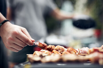 Preparing barbeque on a electrical modern grill outdoors.