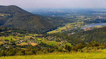 Panoramic view of Beskidy Mountains surrounding Miedzybrodzkie Lake and Porabka town seen from Gora...