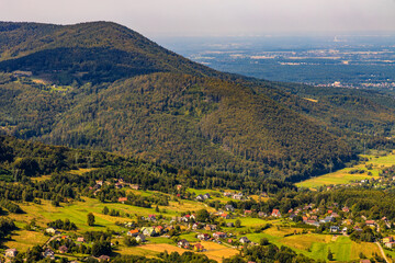 Panoramic view of Beskidy Mountains surrounding Miedzybrodzkie Lake and Porabka town seen from Gora Zar mountain near Zywiec in Silesia region of Poland
