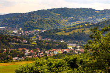 Panoramic view of Beskidy Mountains surrounding Miedzybrodzkie Lake and Miedzybrodzie town seen from Gora Zar mountain near Zywiec in Silesia region of Poland