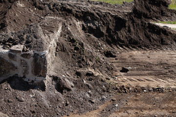 foundation and basement of the house on the field