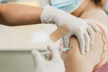 Senior Woman Vaccination Due To Covid-19 Pandemic