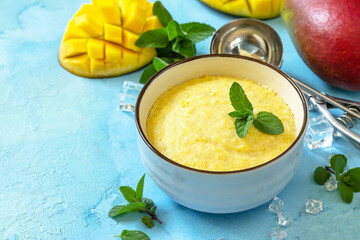 Ice cream, sweet snack or dessert. Homemade mango fruit ice cream, summer tropical fruit sorbet on...
