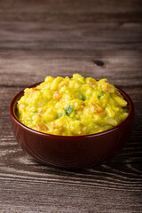 Bowl with guacamole on the table.