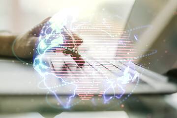 Obraz premium Double exposure of abstract digital world map with connections and hand typing on computer keyboard on background, big data and blockchain concept