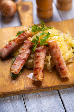 Grilled german sausage links with sauerkraut