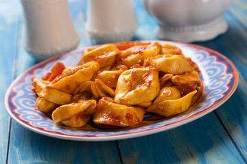 Italian tortellini pasta in tomato sauce